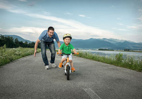 42961919 - happiness father and son on the bicycle outdoor